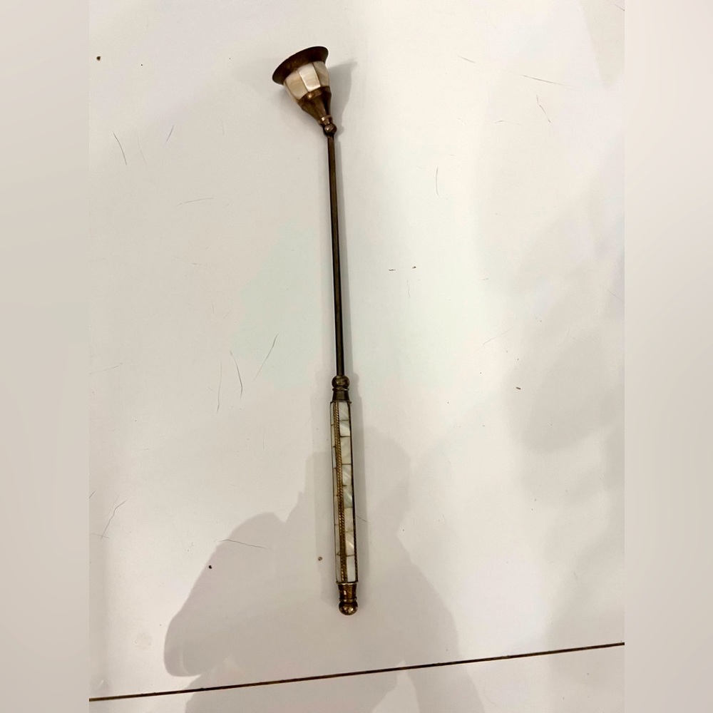 Silver and mother of pearl candle snugger